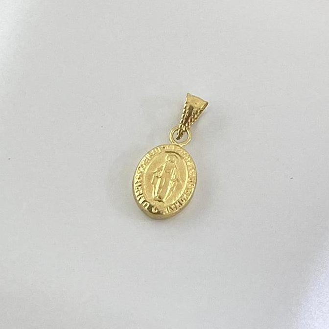 Dije Milagrosa 1.5cm /0.4/gr ID: 702